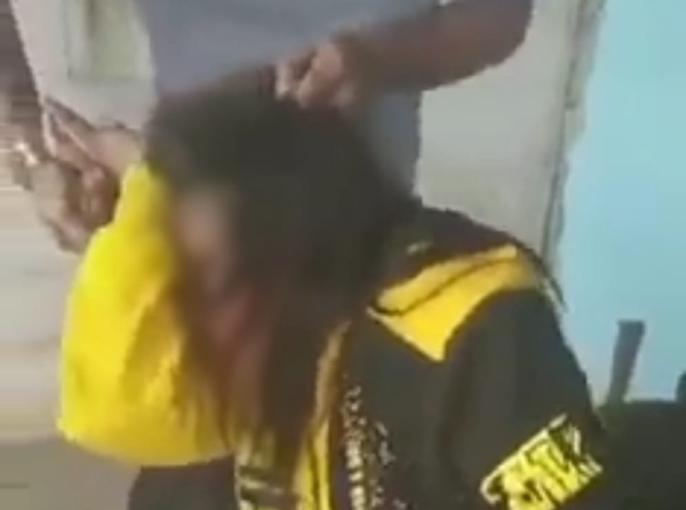 Menganiaya perempuan